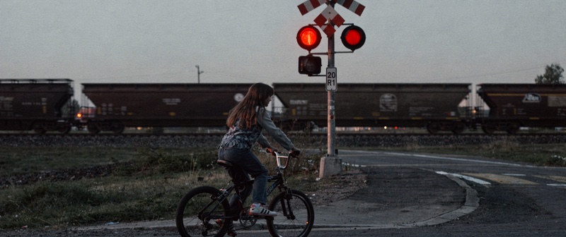A BMX at a level crossing., made with Flux 2 Pro